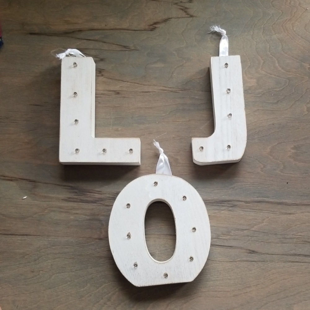 White wood letters that light up.